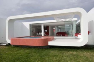 Casa de praia em Palabritas, por José Orrego. Interiores contrastantes e transparência intimista