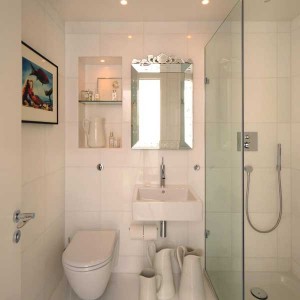 Banheiro de Loft Triplex por TG Studio em Londres