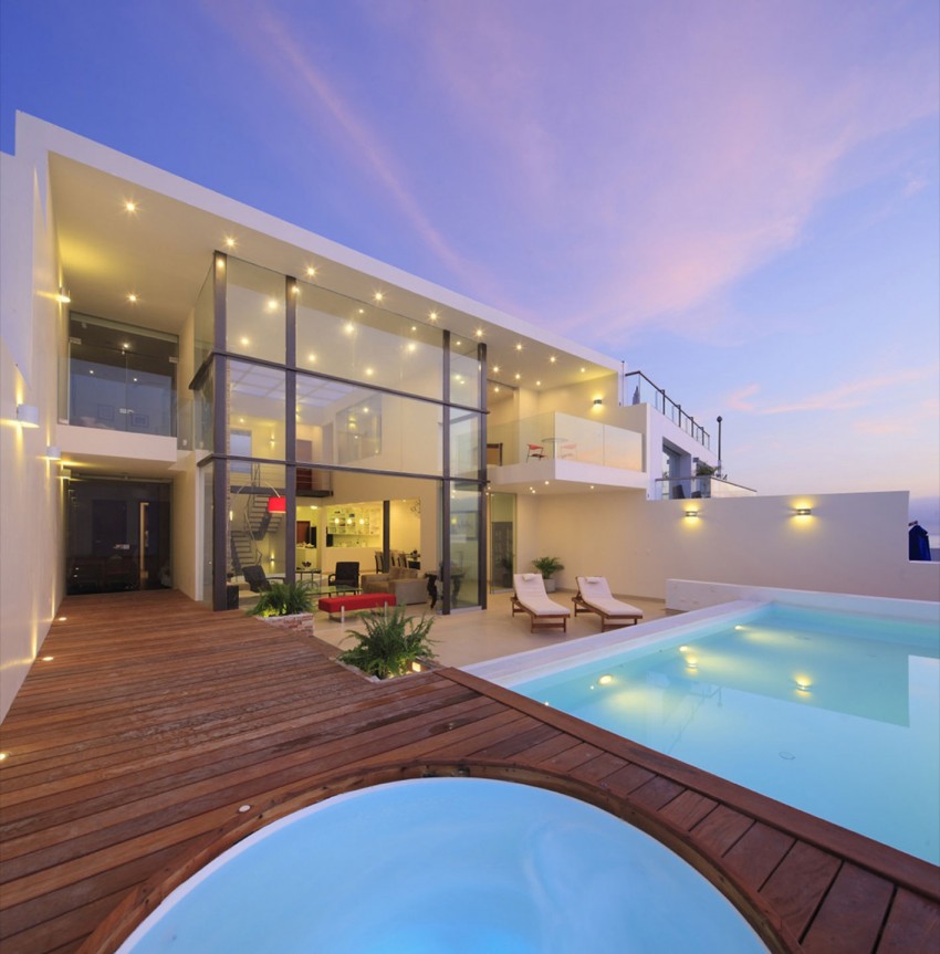 fachada-de-vidro-casa-de-praia-em-playa-senoritas