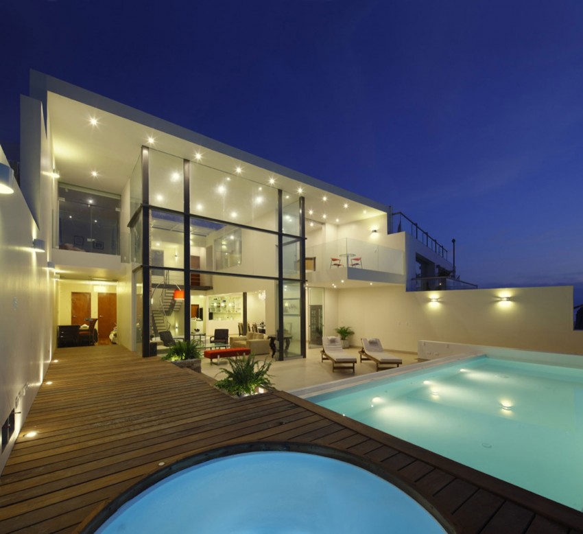 fachada-de-vidro-pe-direito-duplo-casa-de-praia-em-playa-senoritas