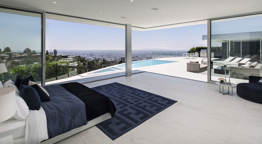 arquitetura-moderna-suite-master-integrada-a-piscina