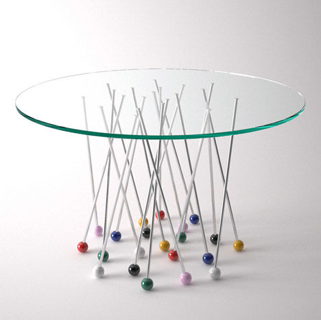 design-criativo-mesa-de-jantar-redonda-com-alfinetes-coloridos